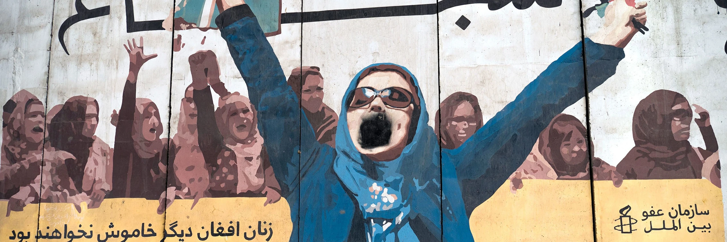 © "Die afghanische Frauen werden nicht länger schweigen": Wandgemälde auf einer Mauer in der afghanischen Hauptstadt Kabul im Januar 2023 7 AFP via Getty Images