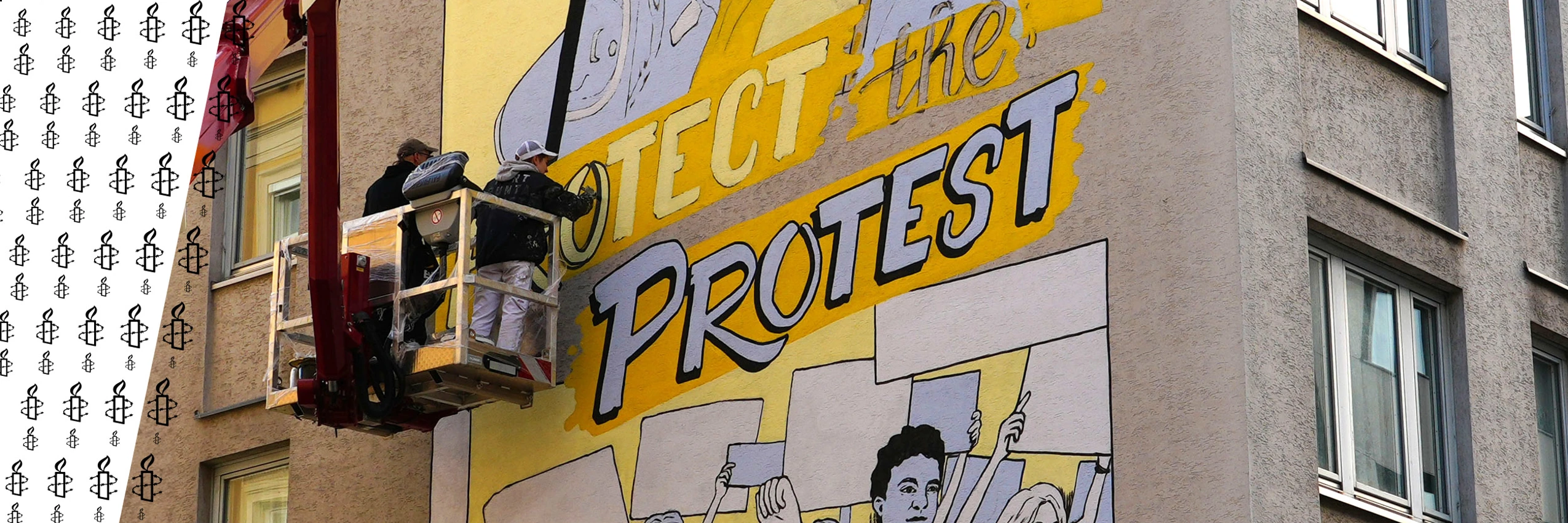 An einer Hausmauer in Wien entsteht ein neues Mural. © Harald Wandl / Amnesty International