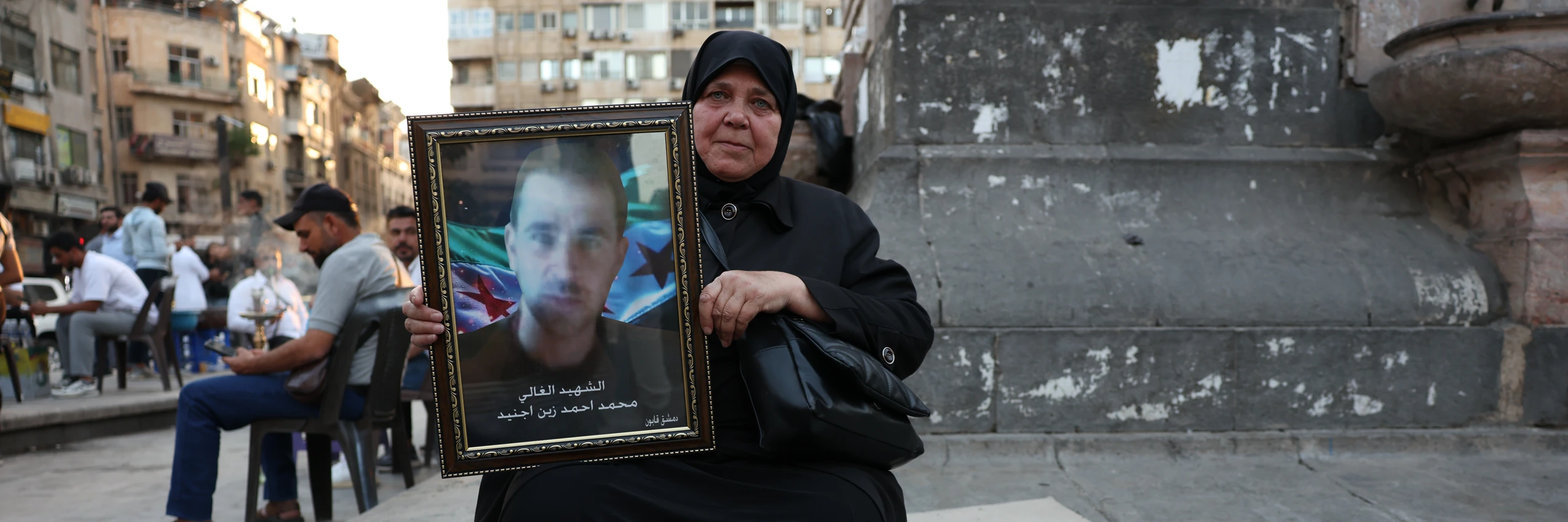 Eine Angehörige einer verschwundenen Person in Damaskus, Syrien © Ali Haj Suleiman / Amnesty International